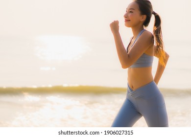 Portrait Sport Young Asian Woman Prepare Exercise Or Run On The Beach Sea Ocean For Health