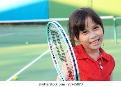 Portrait Of Sporty Beautiful Asian Girl Tennis Player
