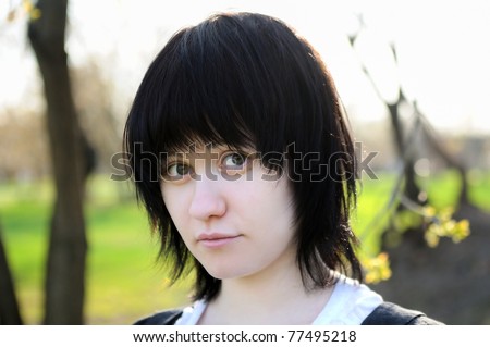 Portrait of a spring funny young woman looking at you