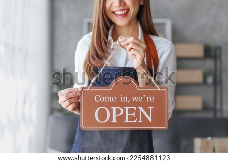 Portrait of Starting small businesses SME owners female entrepreneurs working on receipt box and check online orders to prepare to pack the boxes, sell to customers, SME business ideas online.