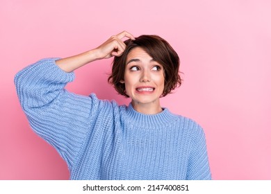 Portrait Of Stressed Hesitant Female Scratch Head Look Empty Space Can't Remember Isolated On Pink Color Background