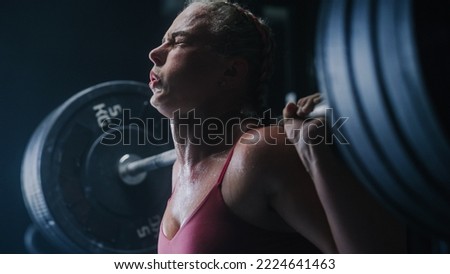 Portrait of Strong Sports Woman Overcoming the Workout Pain to Improve Her Physical Endurance. A Determined Female Athlete Trying To Beat her Personal Record by Training and Exercising. Close Up Shot ストックフォト © 