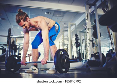 Topless girls weightlifting — img 10