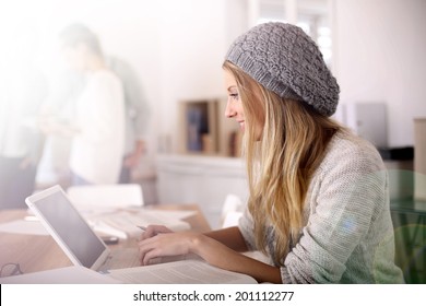 Portrait Of Student Girl Working On Laptop