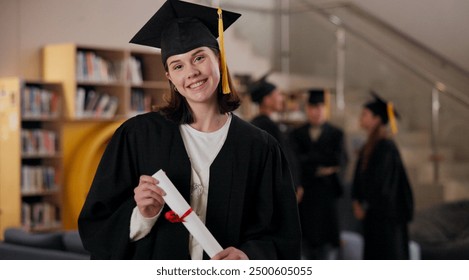 Portrait, student and happy girl at graduation with diploma in university for future success or achievement. Face, woman and college graduate with scroll for education milestone, award or certificate - Powered by Shutterstock