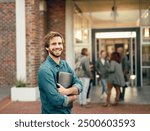 Portrait, student and man with smile, campus and happiness with education, institute and knowledge. Face, academic and person with confidence, learning and pride with achievement, joyful and college