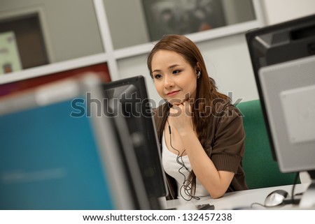 Portrait of a student working in a computer-class