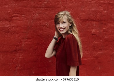 Portrait Of Stunning Woman In Red Dress