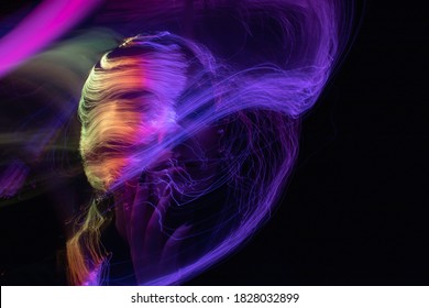 Portrait In The Style Of Light Painting. Long Exposure Photo