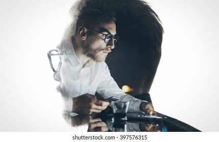 Portrait of stylish bearded lawyer wearing glasses and looking city. Double exposure, businessman working laptop at night, texting smartphone background. Isolated white. Horizontal - Powered by Shutterstock