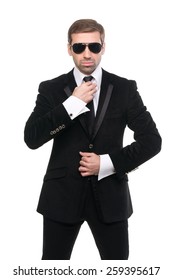 Portrait Of Stylish Bodyguard With Sunglasses. Isolated Over White Background