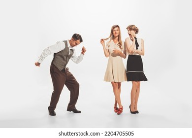 Portrait Of Stylish People In Vintage Clothes, Man And Women At The Party, Dancing, Talking, Posing Isolated On White Background. Concept Of Retro Fashion, Style, Youth Culture, Emotions, Beauty, Ad