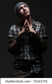 Portrait Of Stylish Young Man Looking Up