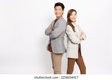 Portrait of successful business asian couple in suit with arms crossed and smile isolated over white background - Powered by Shutterstock