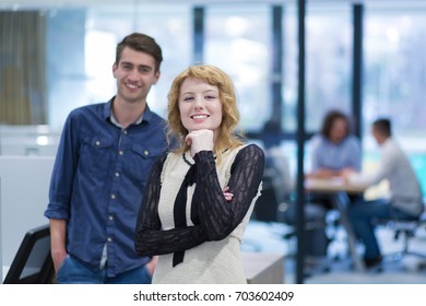 Portrait Of Successful Business people Entrepreneur At Busy startup Office - Shutterstock ID 703602409