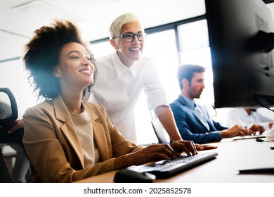 Portrait of successful business team working in office