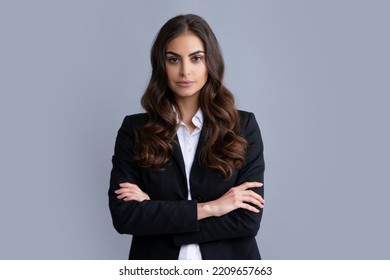 Portrait of successful business woman in suit on gray isolated background. Serious office female worker, manager employees.