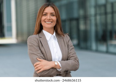 Portrait of a successful business woman in suit - Powered by Shutterstock