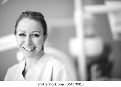 Portrait of a successful dentist in clinic