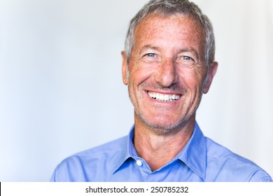 Portrait Of A Successful Handsome Mature Man Smiling 