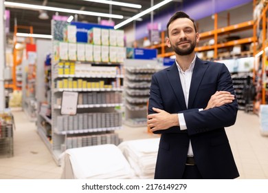 Portrait Of A Successful Hardware Store Owner In A Business Suit