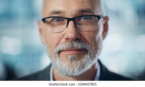 Portrait of Successful Middle Aged Bearded Man Looking at Camera and Smiling. Handsome Senior Businessman Wearing Jacket, Having Fun. Close-up Shot