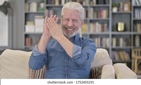 Portrait Of Successful Old Senior Man Clapping