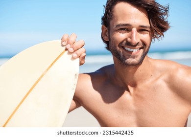 Portrait, surfing and a man in the ocean at the beach for surfing while on summer holiday or vacation. Invite, come and join with a happy young male surfer holding a surfboard outdoor by the sea - Powered by Shutterstock