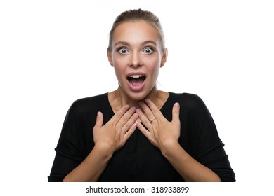 Portrait of surprised beautiful blond woman on white background