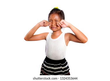 Portrait Of Sweet And Cute Female Child 8 Or 9 Years Old Crying Sad In Pain Feeling Unhappy And Upset Isolated On White Background In Bullying Victim Kid Concept 