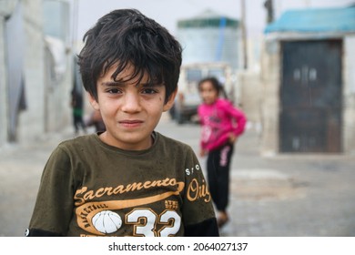 A Portrait Of A Sweet Refugee Child In The Camp. Syrian Refugees.
Aleppo, Syria October 01, 2021