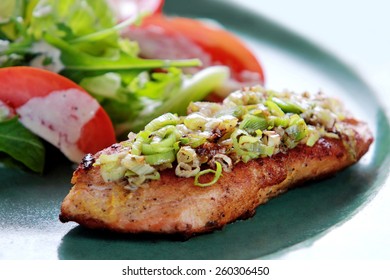 Portrait Of Tasmanian Salmon Grill Served With Salad