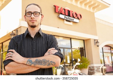 Portrait Of Tattoo Artist Standing Outside Parlor