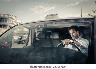 Portrait Of A Taxi Driver