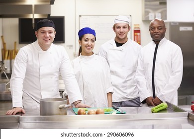 Portrait Of Teacher With Students In College Catering Class - Powered by Shutterstock