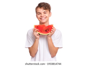 Portrait of teen boy eating ripe juicy watermelon and smiling. - Powered by Shutterstock