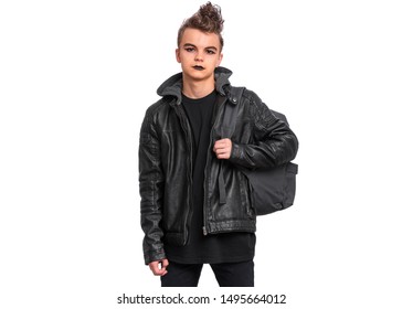 Portrait Of Teen Boy Student With Spooking Make-up Holds Bag, Isolated On White Background. Teenager With Backpack In Style Of Punk Goth Dressed In Black. Problems Of Transitional Age.