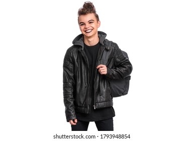 Portrait Of Teen Boy Student With Spooking Make-up Holds Bag, Isolated On White Background. Teenager With Backpack In Style Of Punk Goth Dressed In Black. Problems Of Transitional Age.