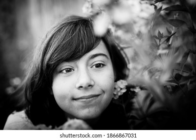 Portrait Of Teen Girl In The Apple Orchard, Black And White Photo.