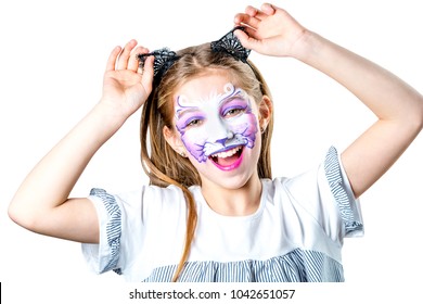 Portrait Of Teen Girl With Cat Face Painting