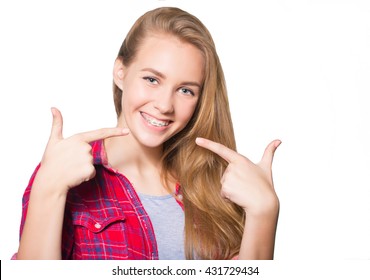 Portrait Of Teen Girl Showing Dental Braces.