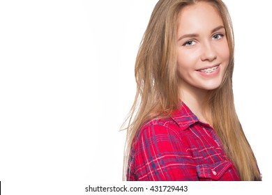 Portrait Of Teen Girl Showing Dental Braces.