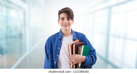 portrait of teenage student with books