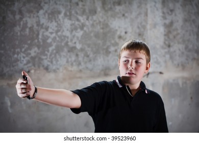 Portrait Of Teenager Against In Profile Against Concrete Wall High Contrast Checkout More Of Same Model