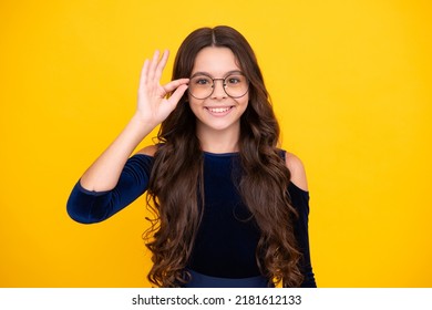 Portrait Of Teenager Child Girl In Glasses. Kid At Eye Sight Test. Girl With Eyeglasses And Looking At Camera. Vision For Children. Happy Face, Positive And Smiling Emotions Of Teenager Girl.