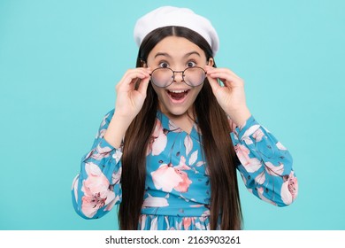 Portrait Of Teenager Child In Glasses. Kid At Eye Sight Test. Girl Holding Eyeglasses And Looking At Camera. Vision, Eyesight Measurement For School Children.