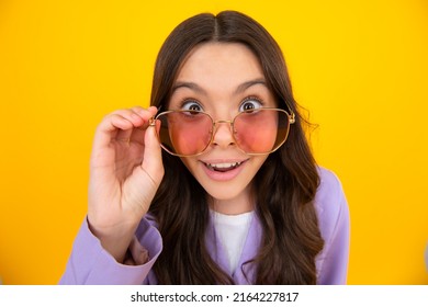 Portrait Of Teenager Child In Sunglasses. Kid At Eye Sight Test. Girl Holding Eyeglasses And Looking At Camera. Vision, Eyesight Measurement For School Children.