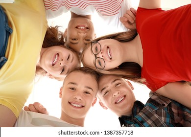 Portrait of teenagers on white background, bottom view - Shutterstock ID 1387357718