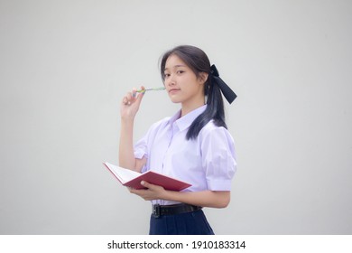 Portrait Of Thai High School Student Uniform Beautiful Girl Think