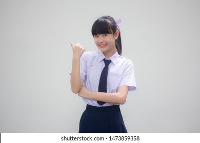 Portrait Of Thai Junior High School Student Uniform Beautiful Girl Pointing